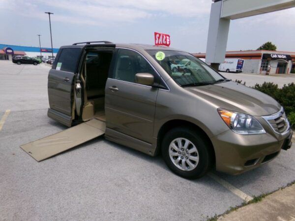 Gold Honda Odyssey with Vantage Mobility Side Entry Automatic In Floor conversion