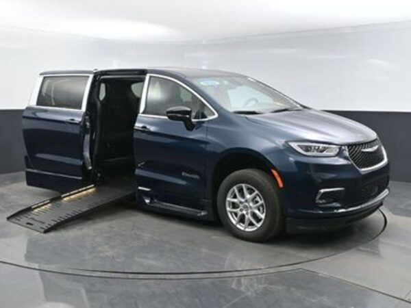 Blue Chrysler Pacifica with BraunAbility Side Entry Automatic Fold Out conversion
