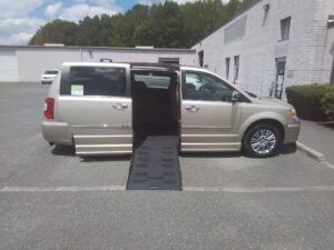 Gold Chrysler Town and Country with BraunAbility Side Entry Automatic Fold Out conversion