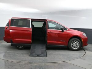 Red Chrysler Voyager with BraunAbility Side Entry Automatic Fold Out conversion