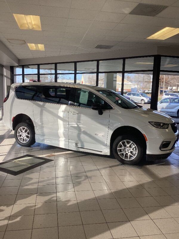 White Chrysler Pacifica with BraunAbility Side Entry Automatic In Floor conversion