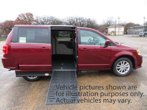 White Dodge Grand Caravan with Adaptive Vans Side Entry Automatic Fold Out conversion