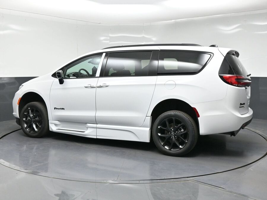 White Chrysler Pacifica with BraunAbility Side Entry Automatic Fold Out conversion