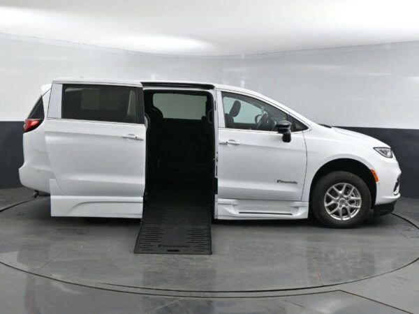 White Chrysler Pacifica with BraunAbility Side Entry Automatic Fold Out conversion