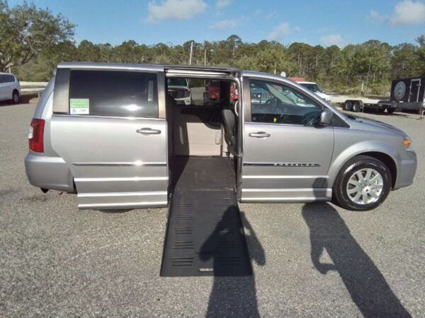 Silver Chrysler Town and Country with BraunAbility Side Entry Automatic Fold Out conversion