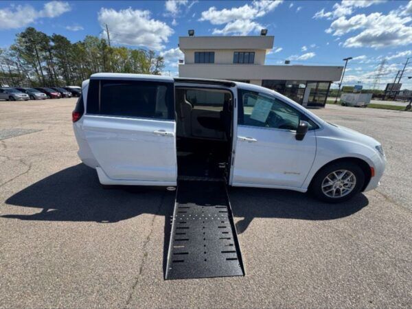 White Chrysler Voyager with Driverge Side Entry Automatic Fold Out conversion