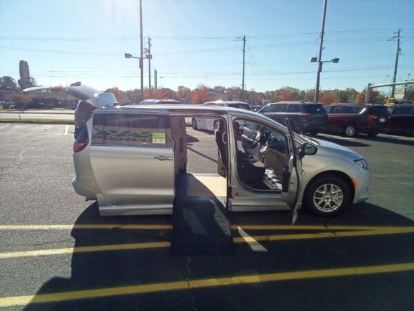 Silver Chrysler Voyager with BraunAbility Side Entry Automatic Fold Out conversion