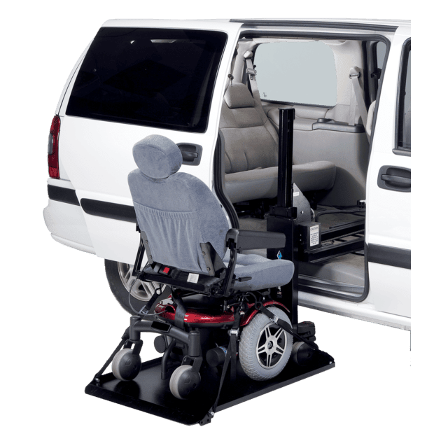 The Harmar Side Door Hybrid Platform Lift (AL690) is installed at the side door of a white van, ready to transfer motorized wheelchairs and scooters into the vehicle.