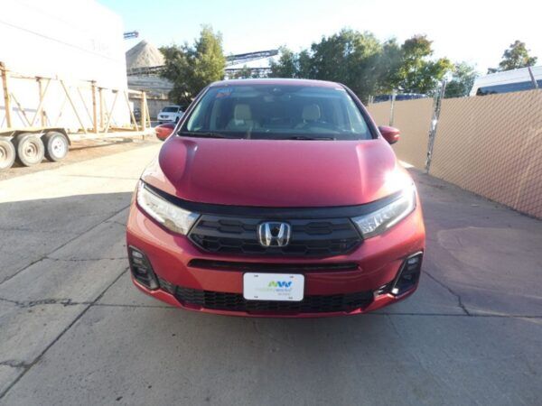 Red Honda Odyssey with BraunAbility Side Entry Automatic In Floor conversion