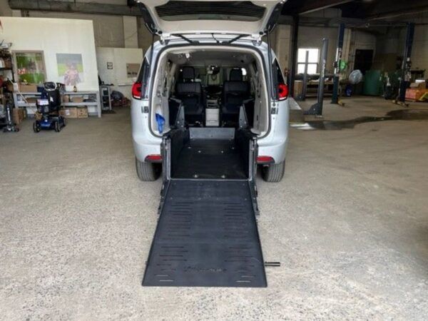 Silver Chrysler Pacifica with BraunAbility Rear Entry Manual Fold Out conversion