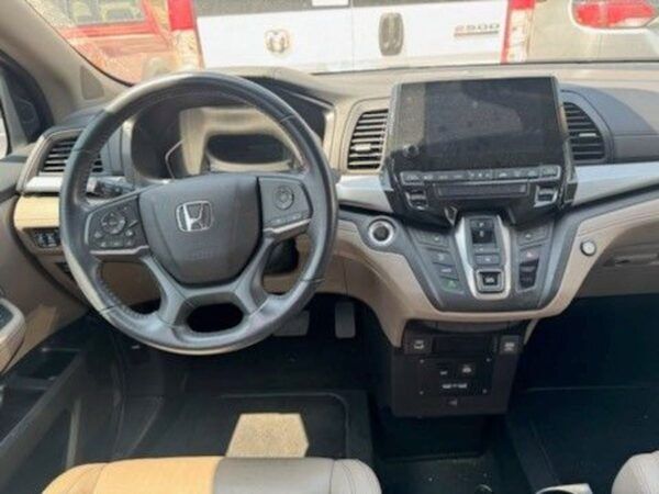 Red Honda Odyssey with Vantage Mobility Side Entry Automatic In Floor conversion