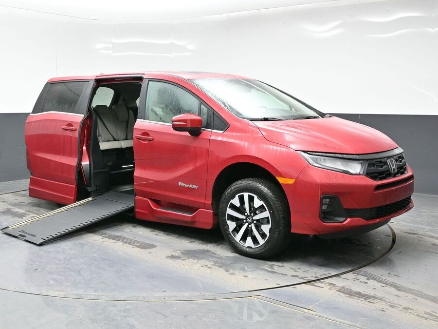Red Honda Odyssey with BraunAbility Side Entry Automatic In Floor conversion