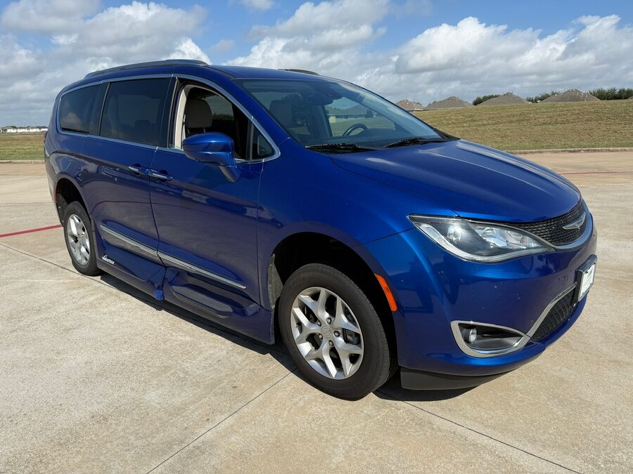 Blue Chrysler Pacifica with Vantage Mobility Side Entry Automatic In Floor conversion