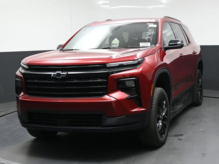 Red Chevrolet Traverse with BraunAbility Side Entry Automatic In Floor conversion