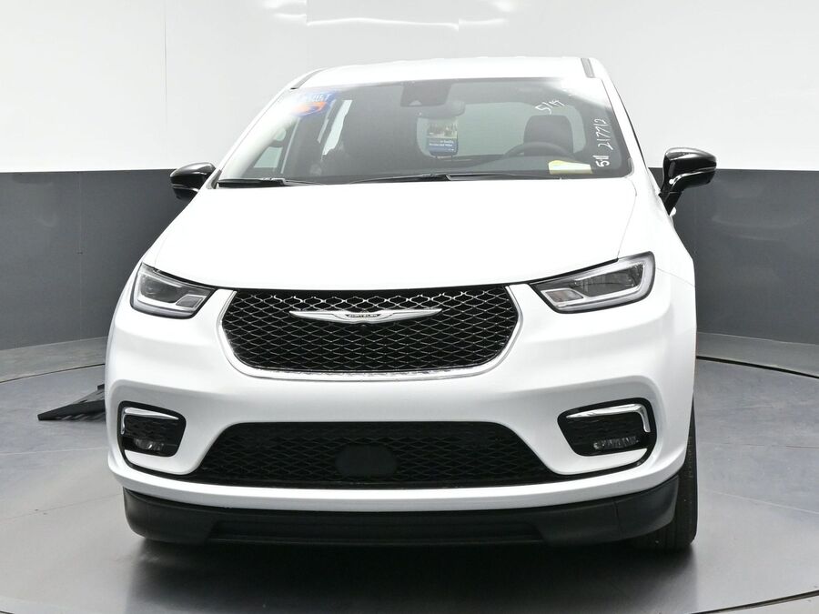 White Chrysler Pacifica with BraunAbility Side Entry Automatic Fold Out conversion
