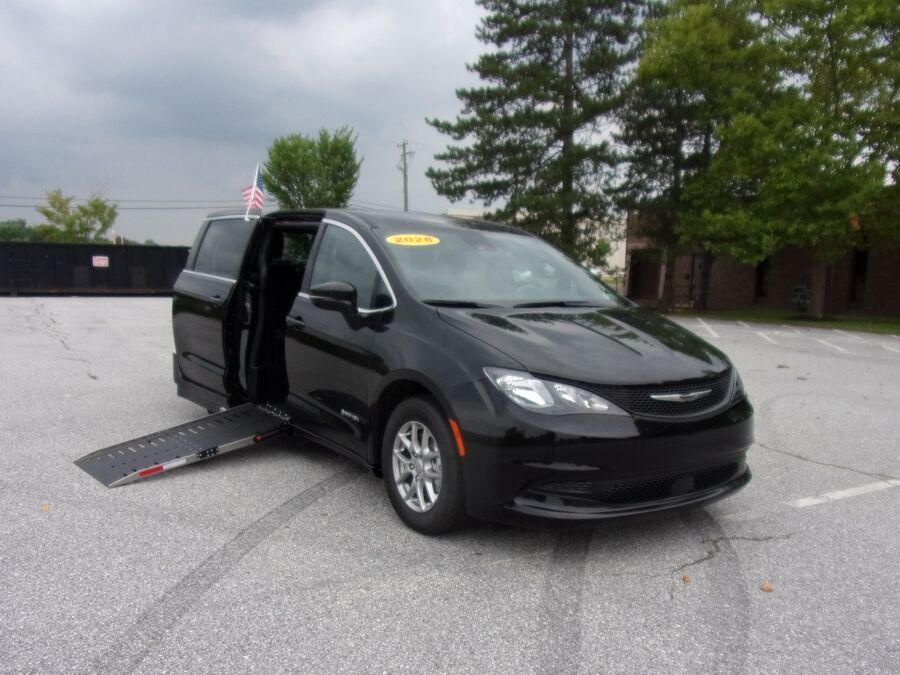 Black Chrysler Voyager with Driverge Side Entry Automatic Fold Out conversion