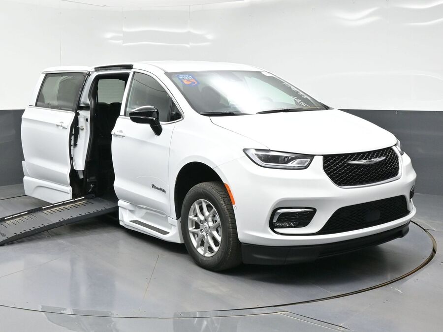 White Chrysler Pacifica with BraunAbility Side Entry Automatic Fold Out conversion