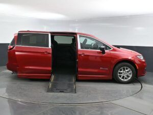 Red Chrysler Pacifica with BraunAbility Side Entry Automatic Fold Out conversion
