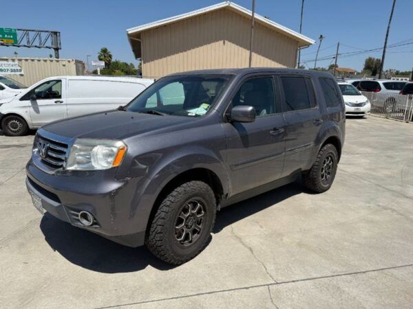 Silver Honda Pilot with Freedom Motors Rear Entry Manual Fold Out conversion