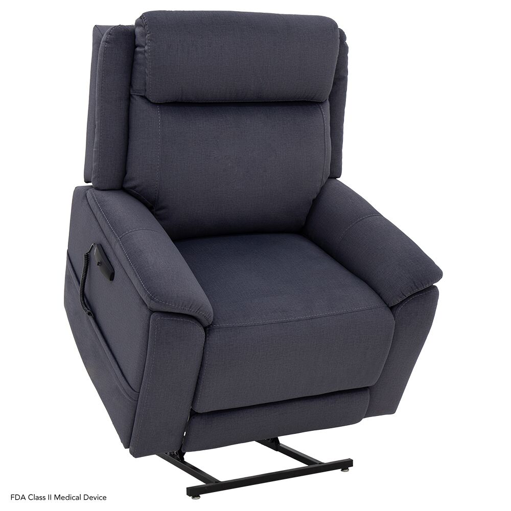 A dark gray upholstered Evolution Lift Chair features padded armrests and a metal support base that extends to assist with standing.