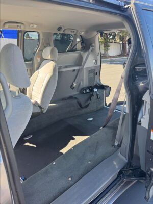 Grey Toyota Sienna with Freedom Motors Rear Entry Manual Fold Out conversion