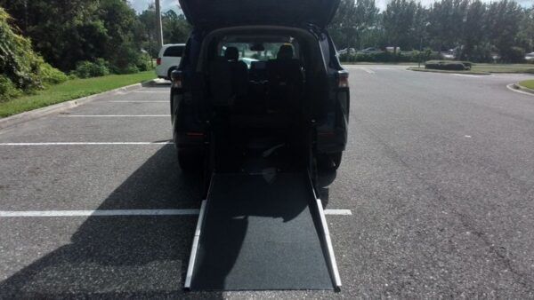 Blue Toyota Sienna with Driverge Rear Entry Manual Fold Out conversion