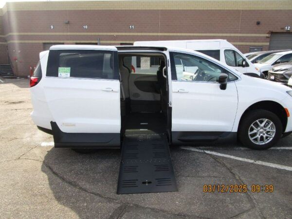 White Chrysler Voyager with Vantage Mobility Side Entry Automatic Fold Out conversion