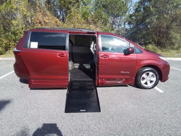 Red Toyota Sienna with BraunAbility Side Entry Automatic Fold Out conversion