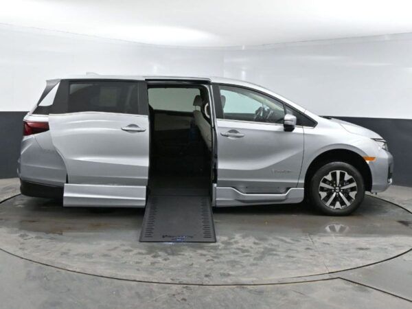 Silver Honda Odyssey with BraunAbility Side Entry Automatic In Floor conversion
