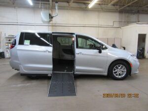 Silver Chrysler Pacifica with Driverge Side Entry Automatic Fold Out conversion