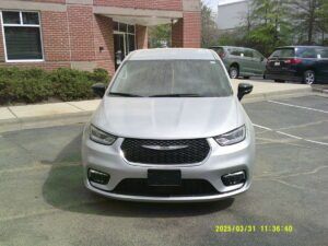 Silver Chrysler Pacifica with Driverge Side Entry Automatic Fold Out conversion