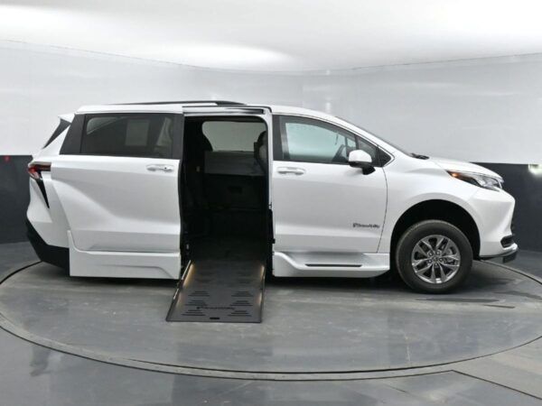 White Toyota Sienna with BraunAbility Side Entry Automatic Fold Out conversion