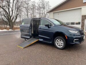 Blue Chrysler Pacifica with Driverge Side Entry Automatic Fold Out conversion