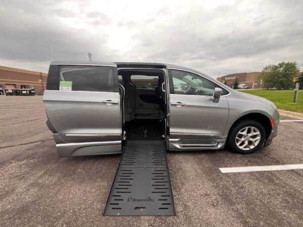 Silver Chrysler Pacifica with BraunAbility Side Entry Automatic Fold Out conversion