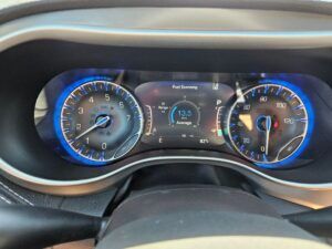Red Chrysler Pacifica with BraunAbility Side Entry Automatic Fold Out conversion