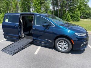 Blue Chrysler Pacifica with BraunAbility Side Entry Automatic Fold Out conversion
