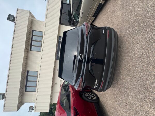 Black Toyota Sienna with BraunAbility Side Entry Automatic In Floor conversion