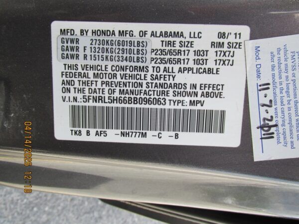 Brown Honda Odyssey with Vantage Mobility Side Entry Automatic In Floor conversion