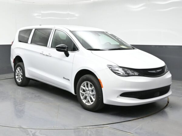 White Chrysler Voyager with BraunAbility Rear Entry Manual Fold Out conversion