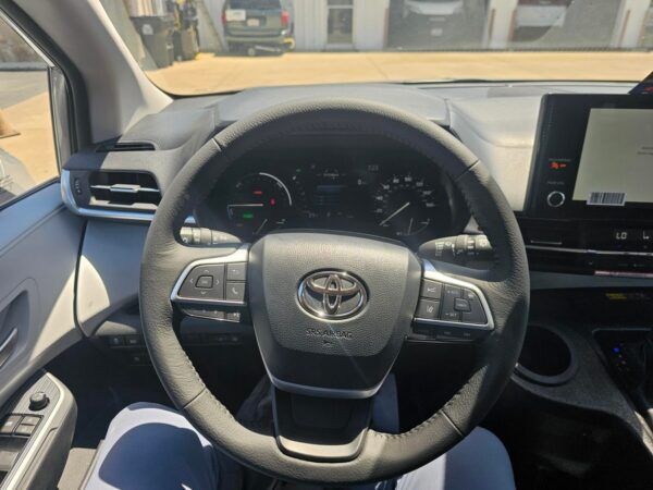 Grey Toyota Sienna with BraunAbility Side Entry Automatic In Floor conversion