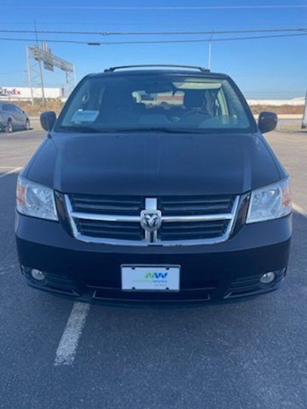 Black Dodge Grand Caravan with Vantage Mobility Side Entry Automatic In Floor conversion