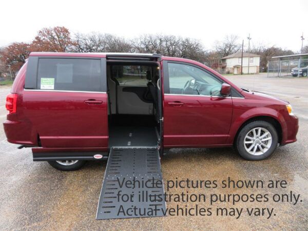 Silver Dodge Grand Caravan with Adaptive Vans Side Entry Automatic Fold Out conversion