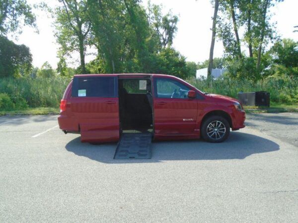 Red Dodge Grand Caravan with BraunAbility Side Entry Automatic Fold Out conversion