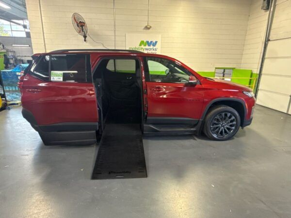 Red Chevrolet Traverse with BraunAbility Side Entry Automatic In Floor conversion