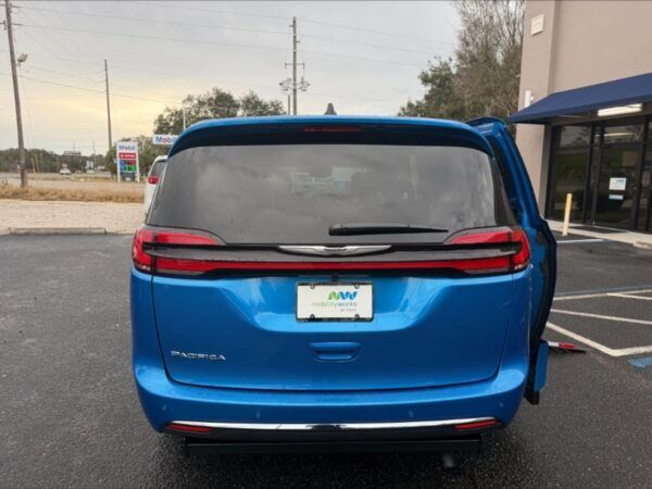 Blue Chrysler Pacifica with Driverge Side Entry Automatic Fold Out conversion