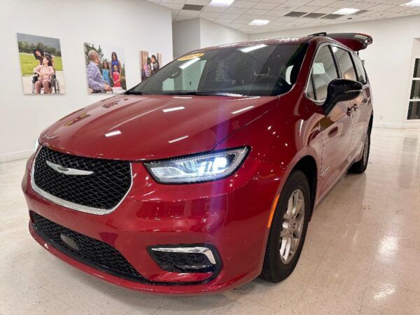 Red Chrysler Pacifica with Driverge Rear Entry Manual Fold Out conversion