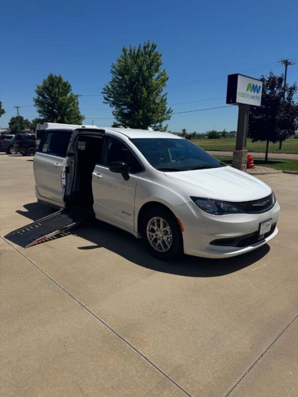 White Chrysler Voyager with Driverge Side Entry Automatic Fold Out conversion