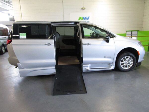 Silver Chrysler Pacifica with BraunAbility Side Entry Automatic In Floor conversion