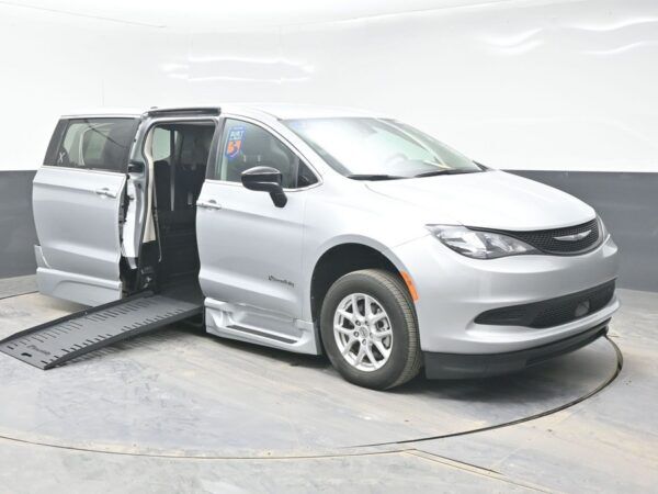 Silver Chrysler Voyager with BraunAbility Side Entry Automatic Fold Out conversion
