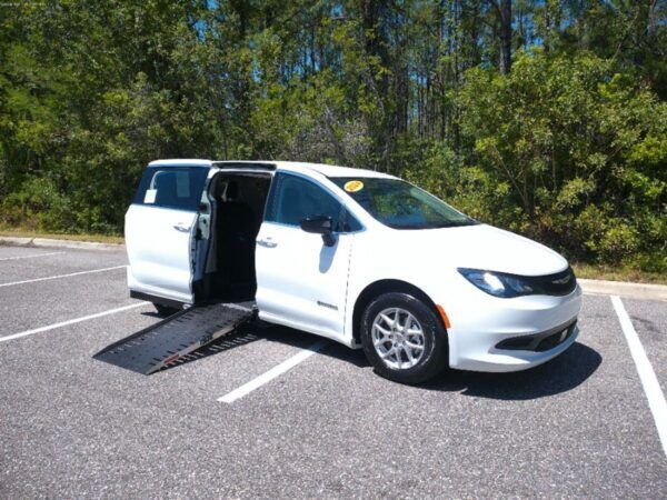 White Chrysler Voyager with Driverge Side Entry Automatic Fold Out conversion